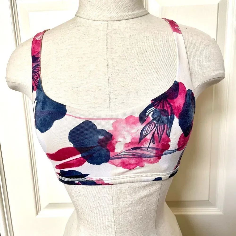 Lululemon pink and blue criss cross strap sports bra